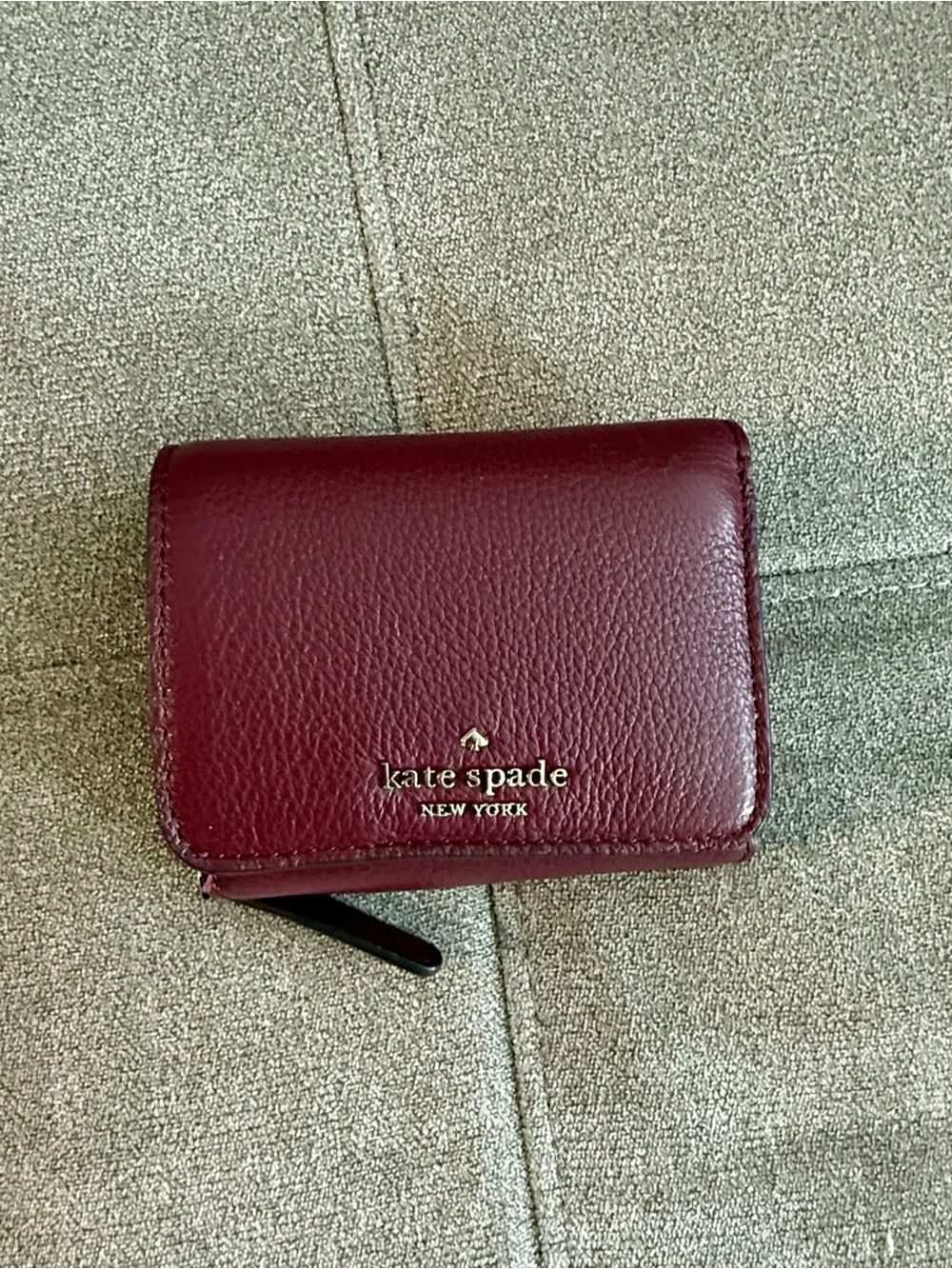 kate spade Burgundy Pebbled Leather Compact Card Holder with Gold Logo